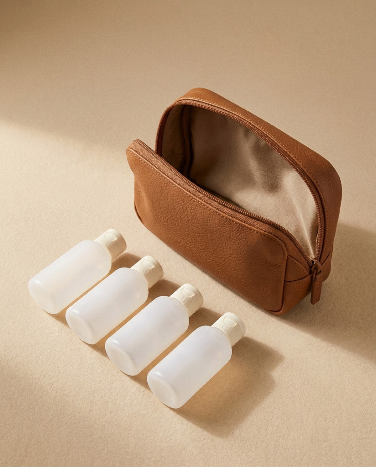 Essential Carry-On Bottle Kit open, showing what fits inside