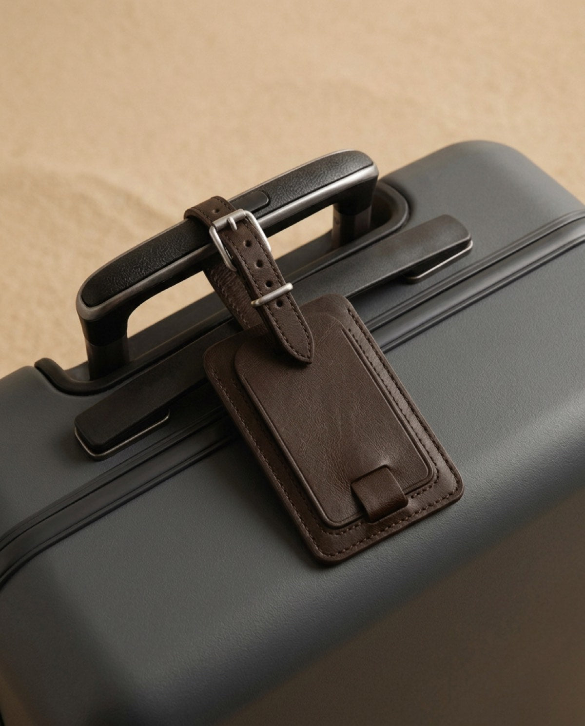 Essential Luggage Tag open, showing what fits inside