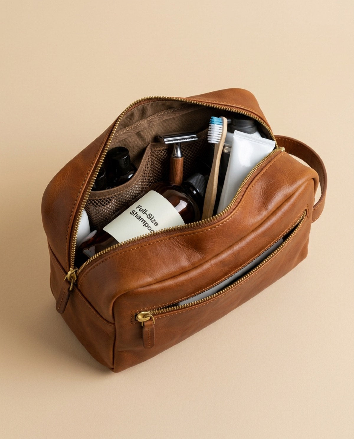 Essential Toiletry Bag open, showing what fits inside