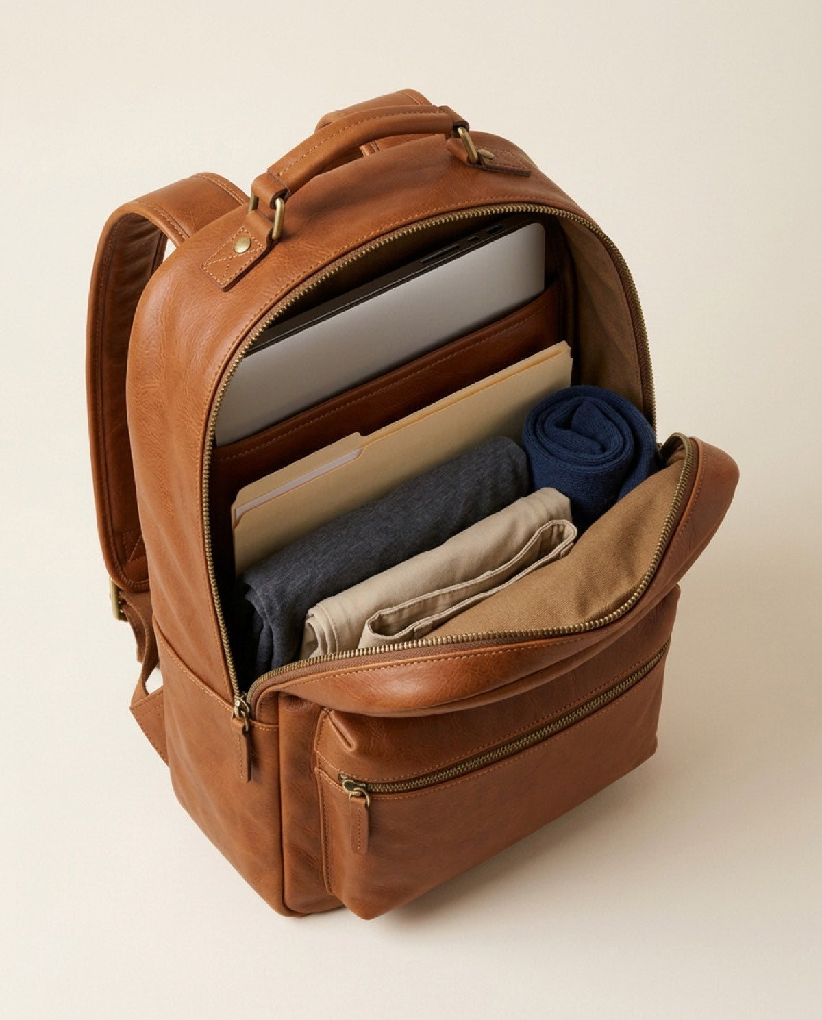 Marylebone Large Backpack open, showing what fits inside