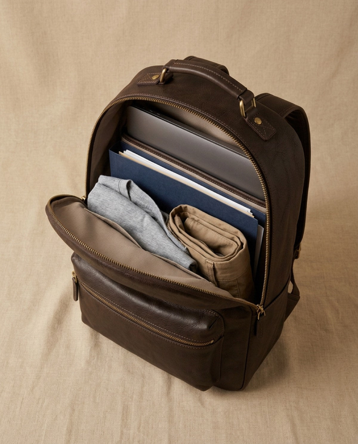 Marylebone Large Backpack open, showing what fits inside