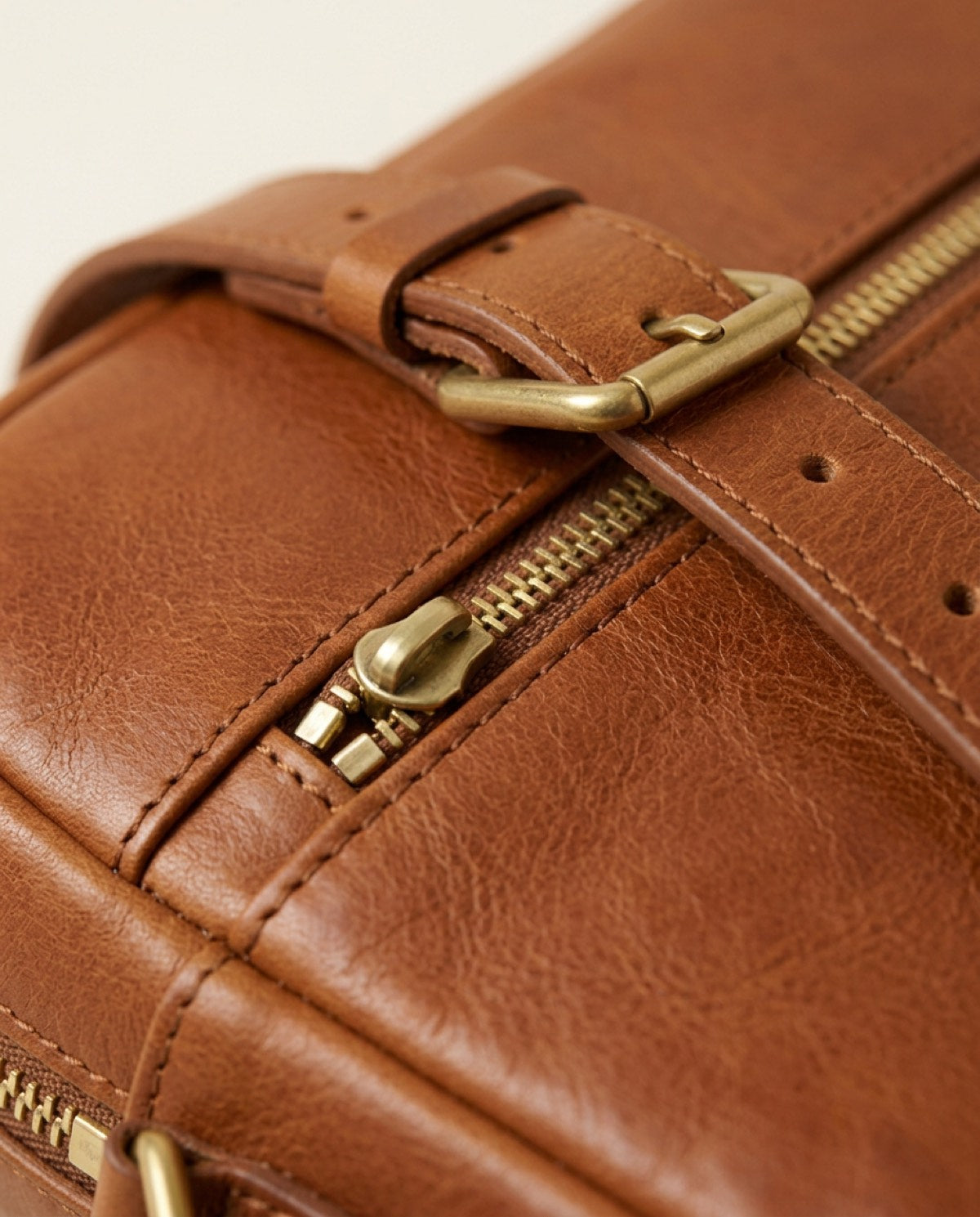 Marylebone Zip Messenger, leather detail