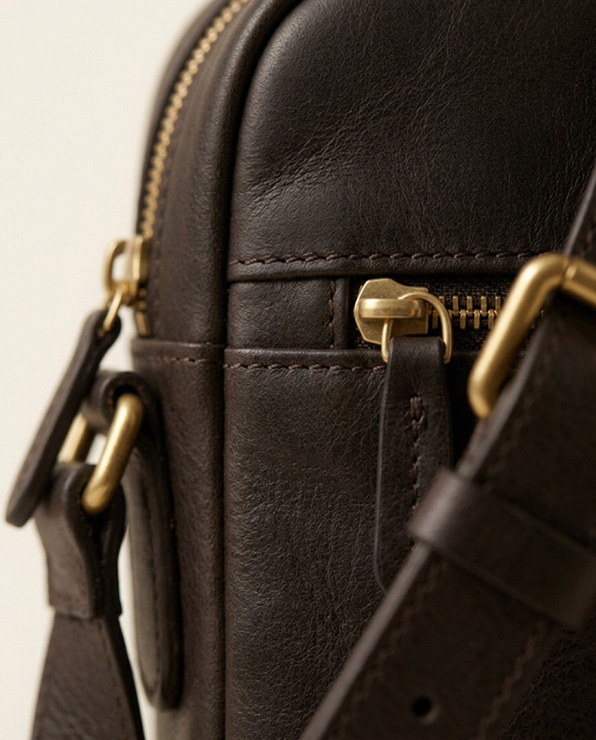 Marylebone Zip Messenger, leather detail